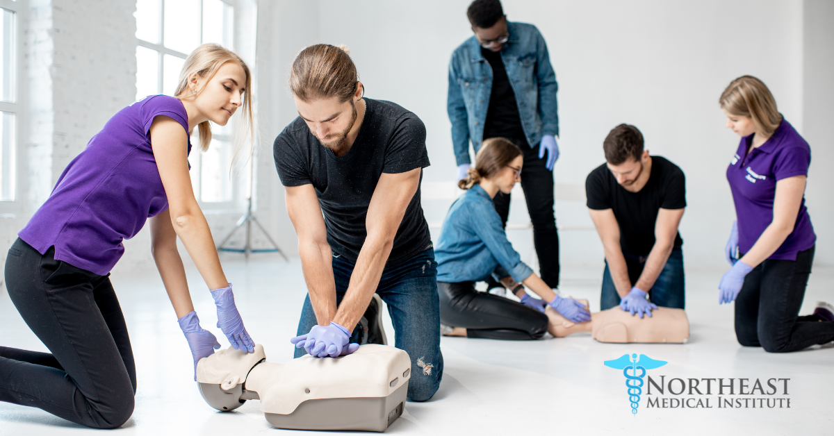 A person performing CPR on a mannequin during BLS certification training course