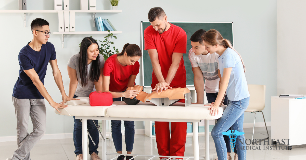 A person performing CPR on a patient